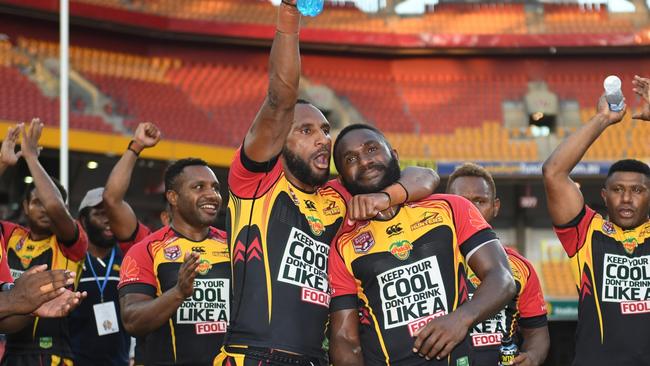 PNG Hunters players celebrate their Queensland Cup title.