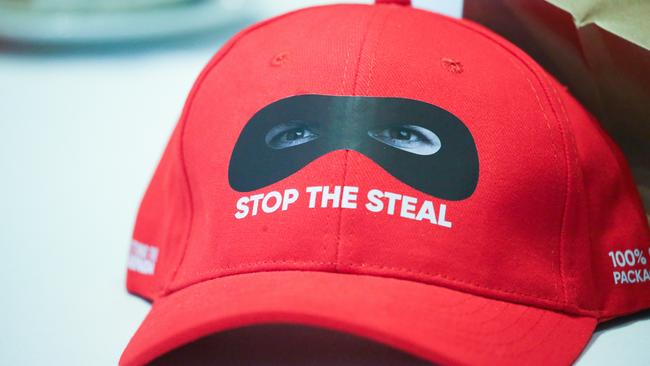 Some delegates in the audience wore red hats with the slogan ‘stop the steal’. Picture: NCA NewsWire/ Gaye Gerard