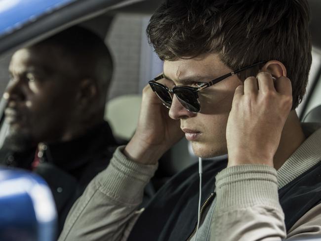 This image released by Sony Pictures shows Ansel Elgort, right, and Jamie Foxx in a scene from "Baby Driver." (Wilson Webb/Sony/TriStar Pictures via AP)