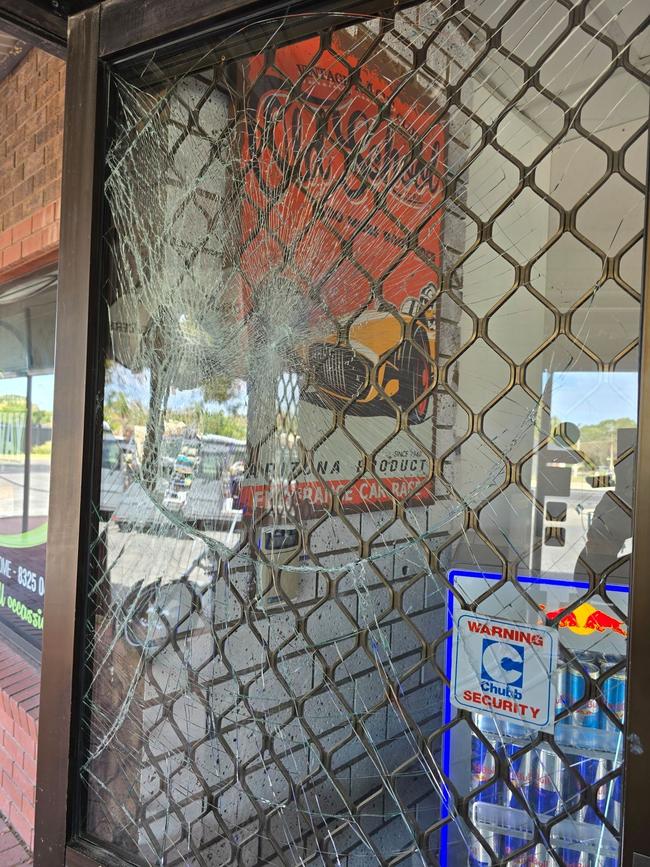 Smashed windows at Big Bite Pizza. Picture: Supplied