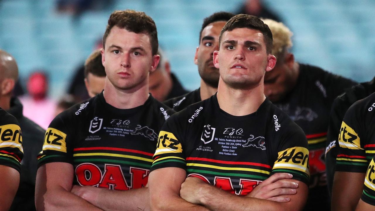 SYDNEY, AUSTRALIA - OCTOBER 25: Dylan Edwards of the Panthers and Nathan Cleary of the Panthers look dejected after losing the 2020 NRL Grand Final match between the Penrith Panthers and the Melbourne Storm at ANZ Stadium on October 25, 2020 in Sydney, Australia. (Photo by Cameron Spencer/Getty Images)