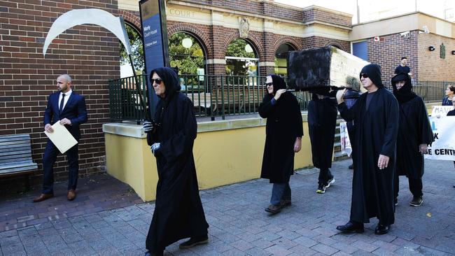 The group on the move to Manly Oval. Picture: Braden Fastier