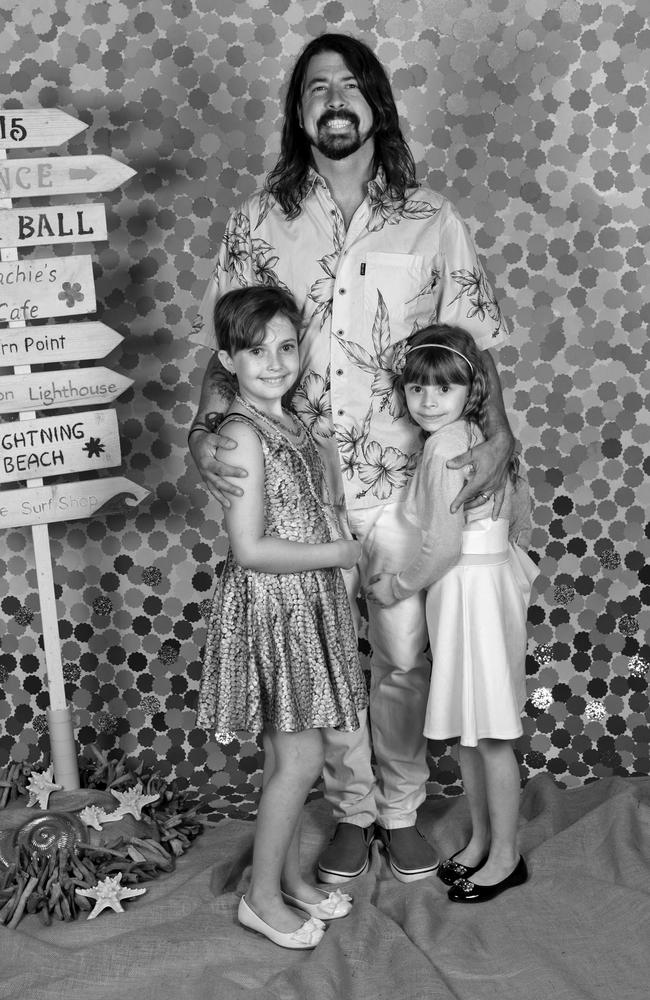 Grohl flew mid tour from Australia to LA and back again to take Violet and Harper to their father-daughter dance. Picture: Supplied.