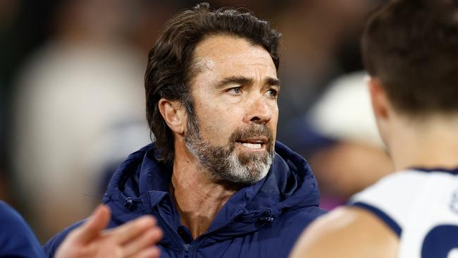 MELBOURNE, AUSTRALIA - SEPTEMBER 21: Chris Scott, Senior Coach of the Cats addresses his players during the 2024 AFL Second Preliminary Final match between the Geelong Cats and the Brisbane Lions at The Melbourne Cricket Ground on September 21, 2024 in Melbourne, Australia. (Photo by Michael Willson/AFL Photos via Getty Images)