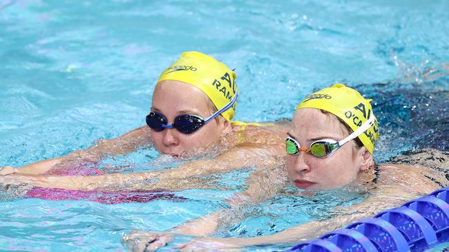 BIRMINGHAM.  25/07/2022 . Australian swim team hits the competition pool for the first time after arriving in Birmingham for the Commonwealth Games.  Australian swimmer Mollie O'Callaghan and Ella Ramsay  . Photo by Michael Klein