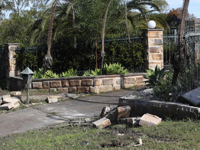 A The remains of the sandstone fence in Caladenia Pl, Elanora Heights. Picture: David Swift