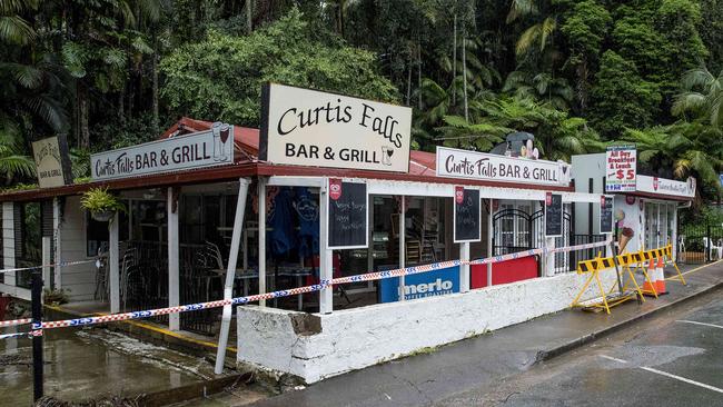 Floodwaters were running through Curtis Falls Bar & Grill at Mount Tamborine, but quickly receded yesterday afternoon. Picture: Jerad Williams