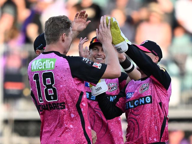 Jack Edwards (left) celebrates a wicket against the Hurricanes. Picture: Steve Bell/Getty Images