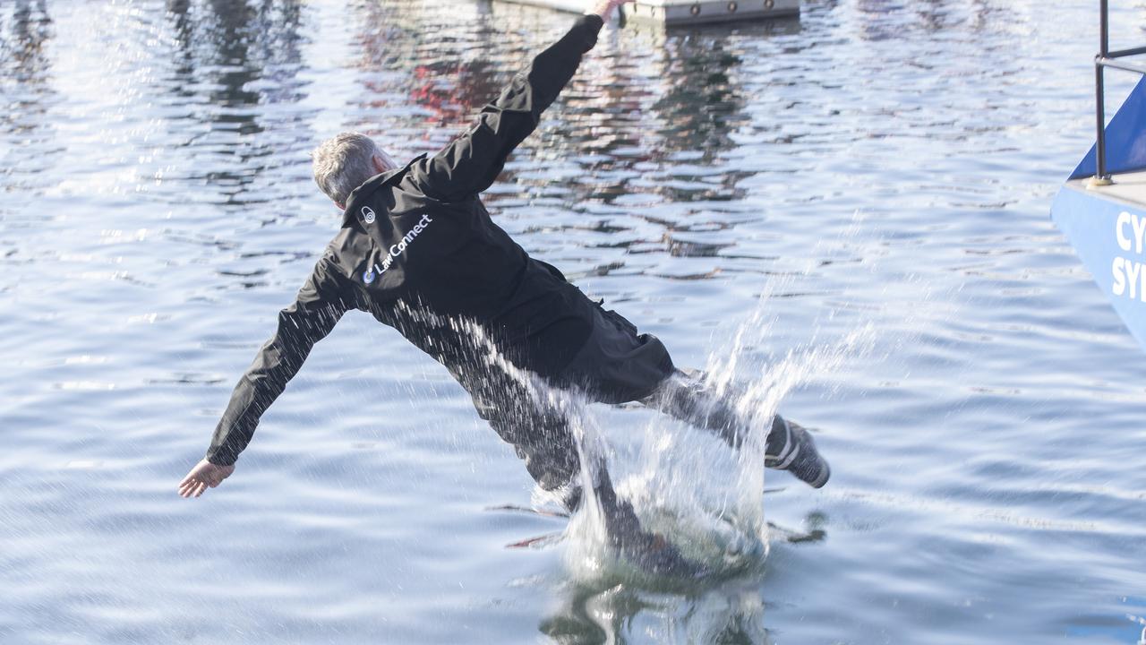 LawConnect skipper/owner Christian Beck is thrown overboard after winning the 2023 Rolex Sydney Hobart yacht race. Picture: Chris Kidd