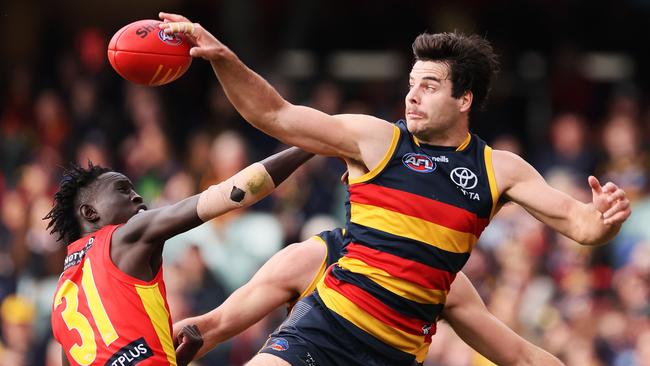 Adelaide, AUSTRALIA - AUGUST 5: Mac Andrew of the Suns competes with Darcy Fogarty of the Crows during the 2023 AFL Round 21 match between the Adelaide Crows and the Gold Coast SUNS at Adelaide Oval on August 5, 2023 in Adelaide, Australia. (Photo by James Elsby/AFL Photos via Getty Images)