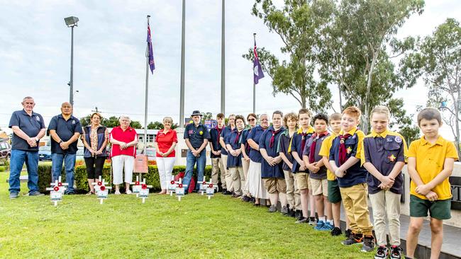 Some of the ANZAC Day event helpers at the Logan Cenotaph. Picture: Richard Walker