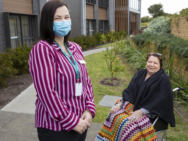 Lauren Smith, who used to be a GP’s assistant doing mainly admin work before switching to a clinical care co-ordinator role, with client Bev Wright. Picture: Peter Stoop