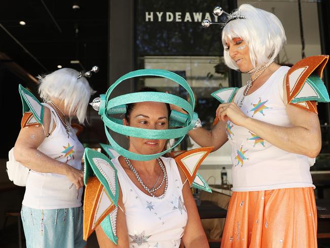 Parade goers prepare ahead of the parade. Picture: Getty Images