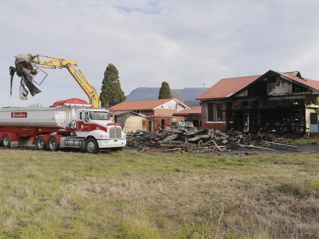 The disused Claremont Primary School is demolished by Hazel Brothers after a fire caused massive damage. Picture: MATT THOMPSON