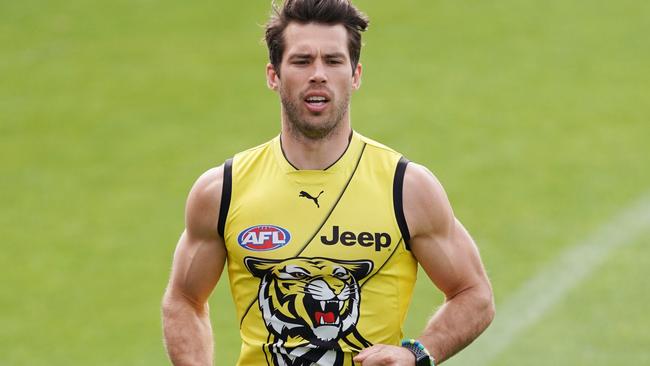 Alex Rance runs laps at Richmond training.