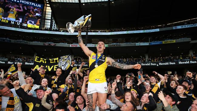 Tiger Dustin Martin celebrates with the premiership cup after Richmond defeated the Adelaide Crows in the 2017 AFL Grand Final at the MCG. Picture: Phil Hillyard