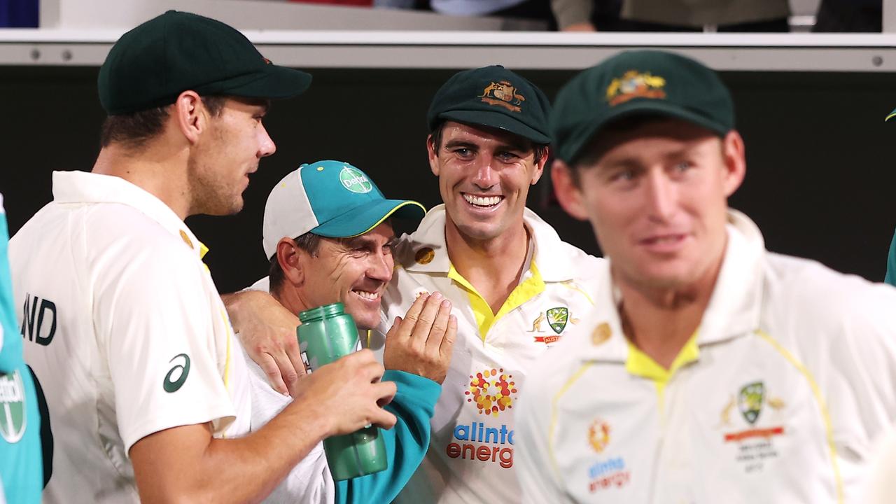 Justin Langer celebrates Australia’s dominant Ashes series victory with Pat Cummins. Picture: Getty Images