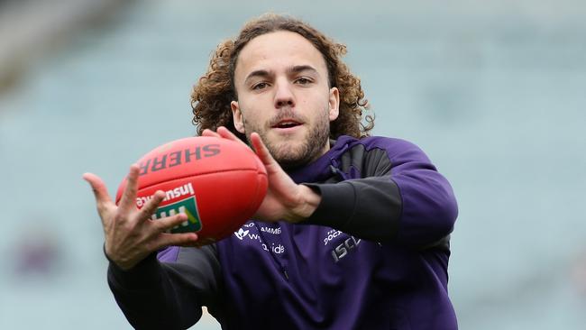 PERTH, WESTERN AUSTRALIA - JULY 02:  Griffin Logue of the Dockers warms up before the round 15 AFL match between the Fremantle Dockers and the St Kilda Saints at Domain Stadium on July 2, 2017 in Perth, Australia.  (Photo by Will Russell/AFL Media/Getty Images)