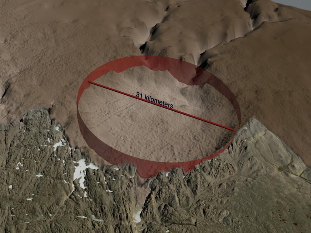 The hidden crater stretches nearly 20 miles (31km) wide. A prominent rim surrounds the depression. Picture: Science