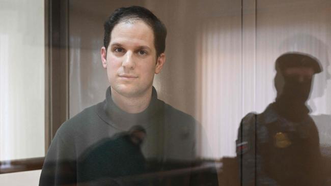 US journalist Evan Gershkovich, arrested on espionage charges, stands inside a defendants' cage before a hearing, at the Moscow City Court in Moscow. Picture: AFP