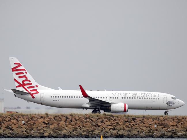 SYDNEY, AUSTRALIA - NewsWire Photos OCTOBER 08, 2020 - A Virgin Australia plane prepares to take off at Sydney Airport on Thursday October 08, 2020.Picture: NCA NewsWire / Christian Gilles