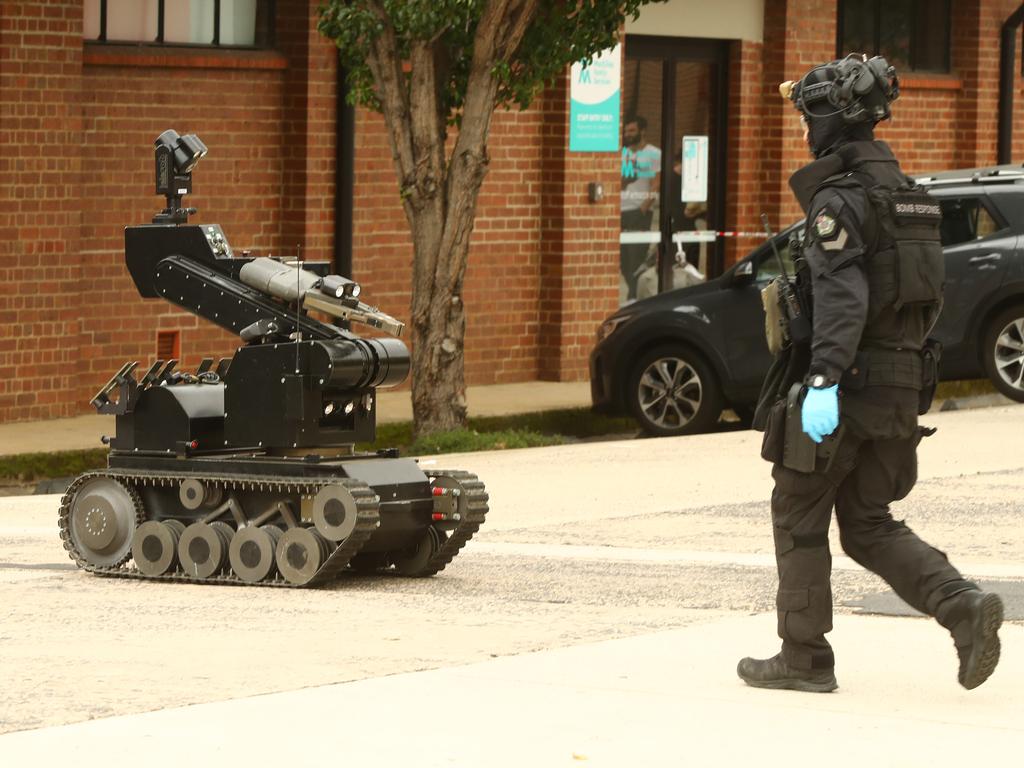 The bomb squad at work at AMDA in Mackay St North Geelong after a suspicious package was delivered on Friday. Picture: Alison Wynd