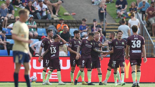 Melbourne City players celebrate during their win over Newcastle. Picture: Scott Gardiner/Getty Images