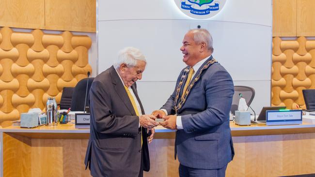 Meriton founder Harry Triguboff receives the keys to the city from Gold Coast Mayor Tom Tate. Picture: Supplied