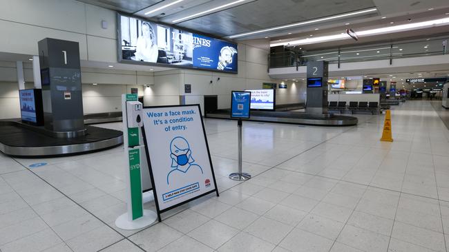 Sydney Airport’s deserted baggage terminal as the city navigates an extended lockdown. Picture: Gaye Gerard.