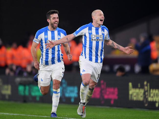 WOLVERHAMPTON, ENGLAND - NOVEMBER 25:  Aaron Mooy of Huddersfield celebrates after scoring his team's second goal during the Premier League match between Wolverhampton Wanderers and Huddersfield Town at Molineux on November 25, 2018 in Wolverhampton, United Kingdom.  (Photo by Laurence Griffiths/Getty Images)