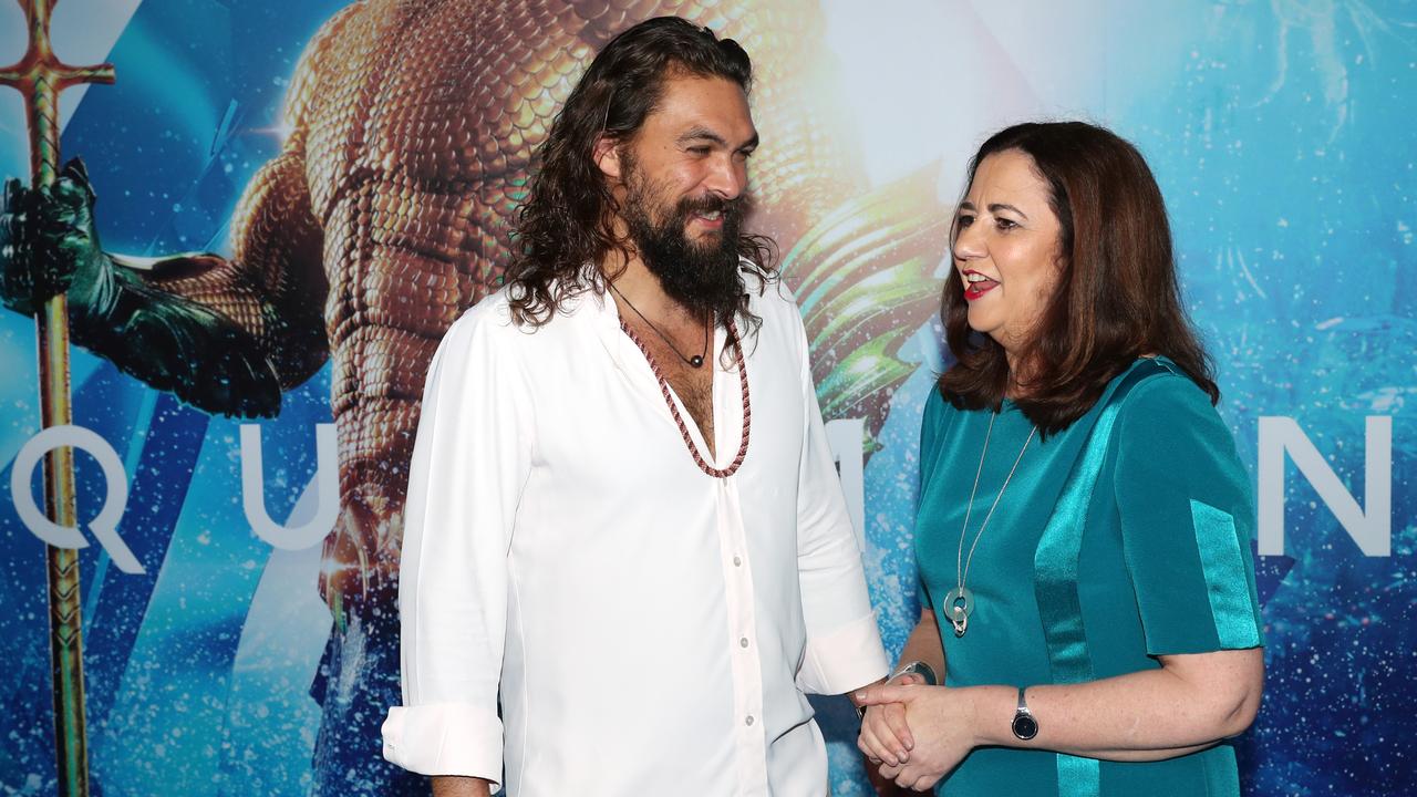 Jason Momoa and Premier Annastacia Palaszczuk. Picture: Nigel Hallett