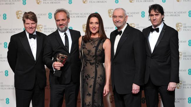 Robert Wade, far left, with Skyfall director Sam Mendes, Barbara Broccoli, Michael G. Wilson and Neal Purvis at the 2013 Bafta awards. Picture: AFP