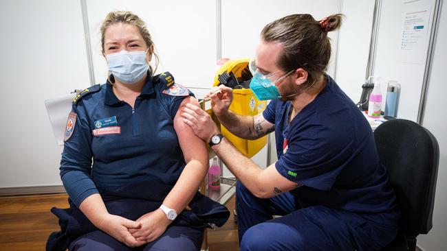 Paramedic Shelly Tennant said she was grateful to return to the Royal Exhibition Building on Wednesday for her second dose of AstraZeneca. Picture: Mark Stewart