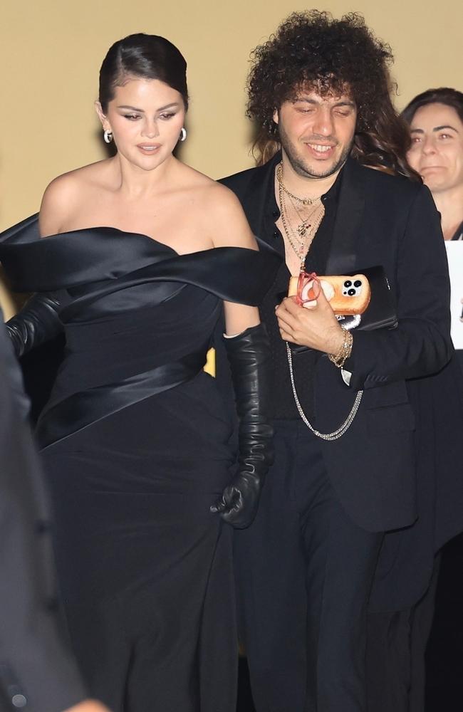 Selena Gomez had some help from her boyfriend, Benny Blanco, as they left an event for her latest film ‘Emilia Perez’. Picture: ShotbyNYP / BACKGRID