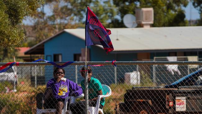 Melbourne Demons players Shane McAdam and Andy Moniz-Wakefield went to Santa Teresa ahead of the 2025 AFL game in Alice Springs. Picture: Melbourne Demons
