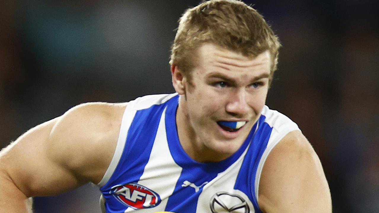 Jason Horne-Francis of the Kangaroos runs with the ball during the round 23 AFL match between the North Melbourne Kangaroos and the Gold Coast Suns at Marvel Stadium.