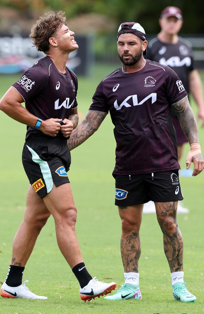 Michael Maguire watches on as Reece Walsh and Adam Reynolds complete fitness tests. Picture: Adam Head