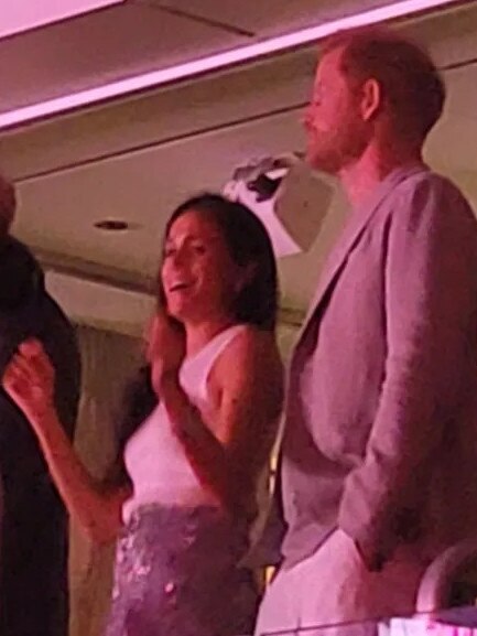 Meghan Markle dancing up a storm. Prince Harry is just Prince Harry. Picture: Twitter