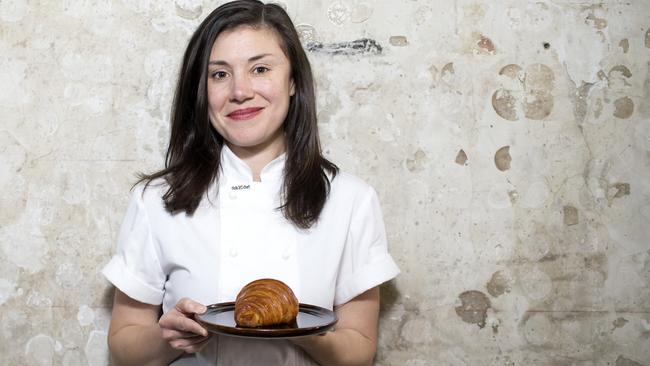 Pastry chef Kate Reid with one of her famed croissants. Picture: Sarah Matray