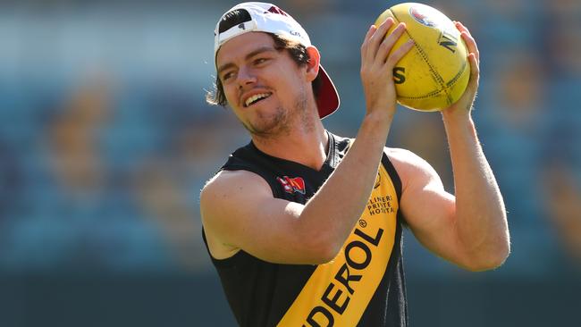 Lachie Neale dons his Glenelg guernsey at a Brisbane Lions training session. Picture: Chris Hyde/Getty Images