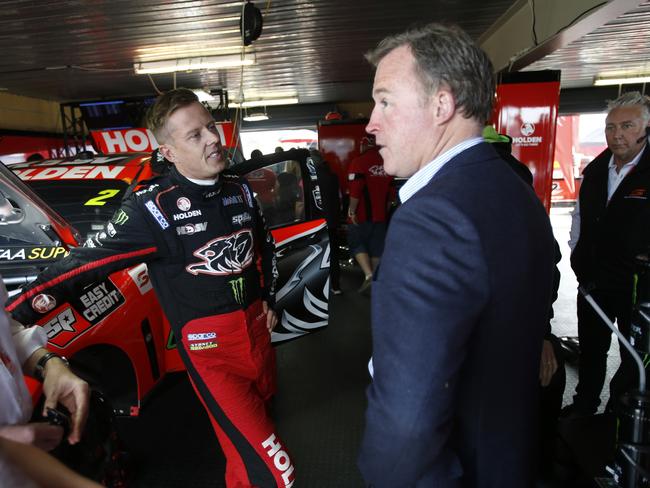 V8 super cars at Symmons plains Tasmania,,picture of premier Will Hodgman speaking with driver James Courtney from the Holden team in the pits
