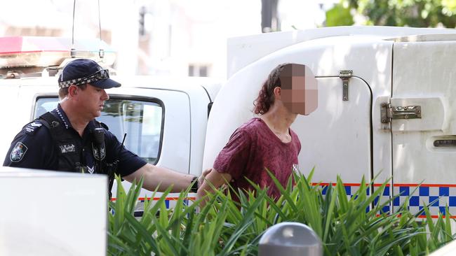 Police officers arrested a man on Lake Street Cairns outside the Alive Pharmacy. Picture: Brendan Radke