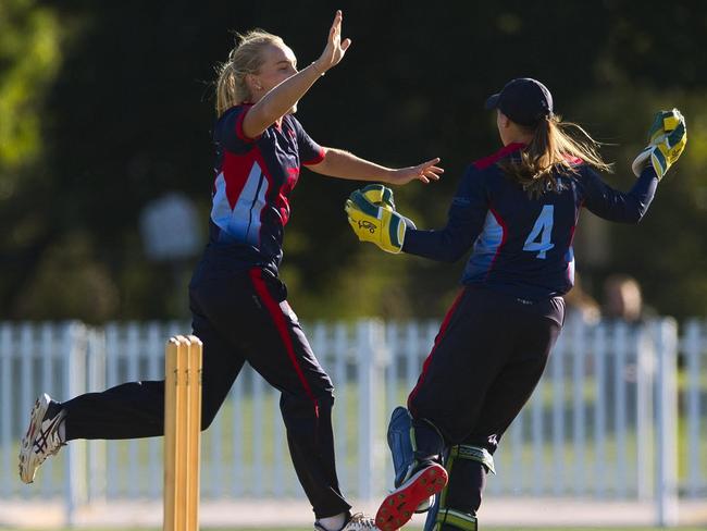 Kim Garth and Nicole Faltum are jubilant after the final wicket. Pic: Chris Thomas, Cricket Victoria.