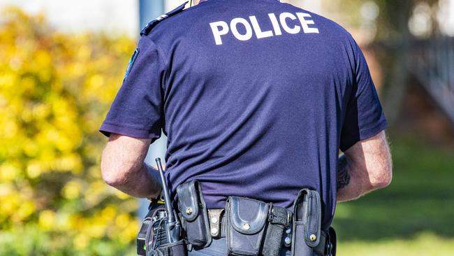 A Queensland police officer has been stood down after being charged with a traffic offence.