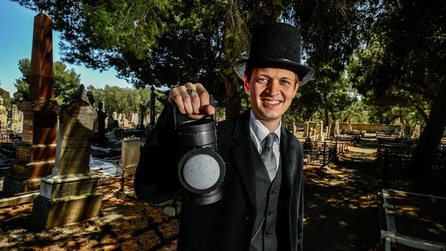 Jacob Douris, host of the West Terrace Cemetery Night Tours, inside the cemetery where he tells groups of Adelaide's eerie past in Adelaide. Picture: AAP/ Morgan Sette