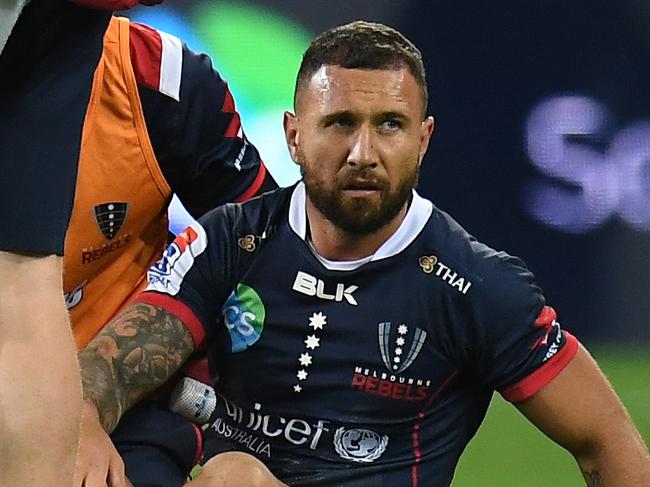 Quade Cooper of the Rebels is seen after sustaining an injury during the Round 13 Super Rugby match between the Melbourne Rebels and the Queensland Reds at AAMI Park in Melbourne, Friday, May 10, 2019.  (AAP Image/Julian Smith) NO ARCHIVING, EDITORIAL USE ONLY