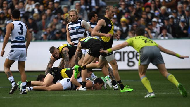 The umpire pays a free kick to the Tigers last Saturday. Picture: AAP