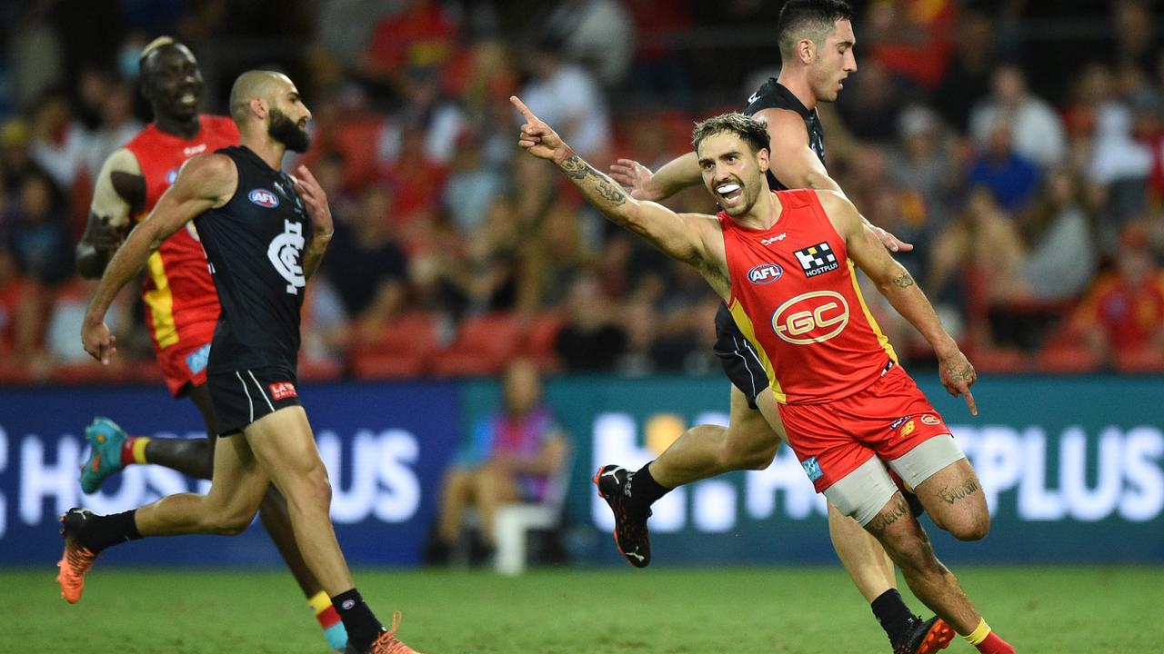 Izak Rankine celebrates a goal against Carlton. Picture: Matt Roberts/AFL Photos/Getty Images