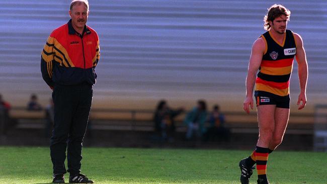 Crows coach Malcolm Blight watches Mark Ricciuto during a training session in 1997.