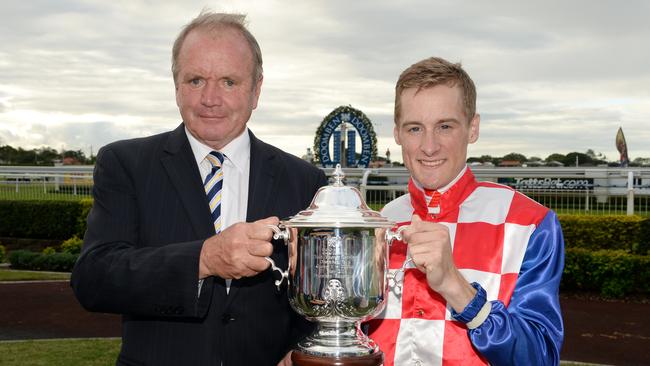 The late Guy Walter holding the Doomben Cup with Blake Shinn after Streama’s win in 2014. Picture: AAP